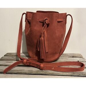 ABLE Leather Bucket Crossbody Bag Womens Rust Brown Tassel Handmade Ethiopia